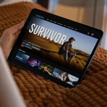 Team defining project requirements around a laptop